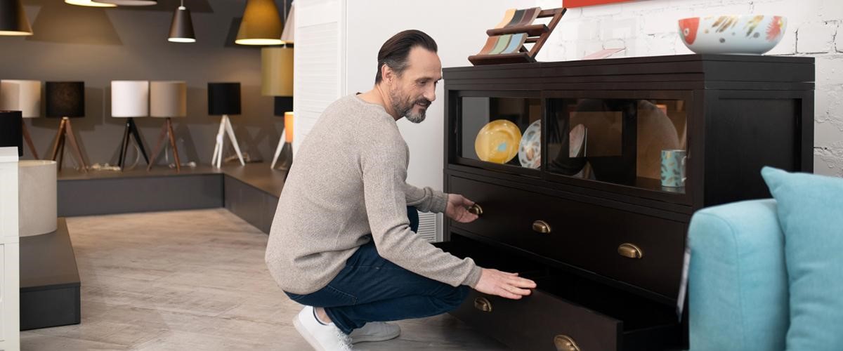 man with cupboard